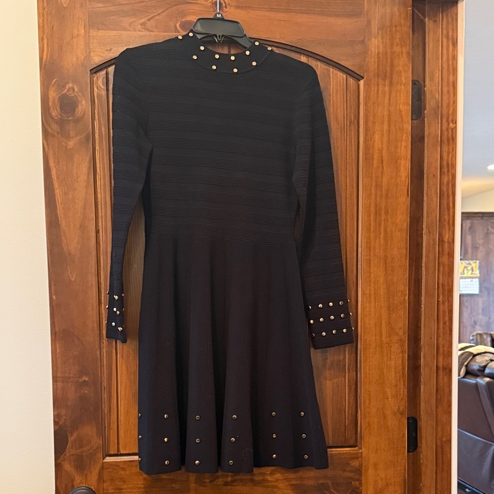 Elegant Black Dress with Gold Accents